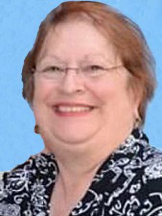 A woman with glasses and a black and white shirt