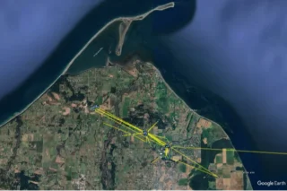 Satellite view of coastal land and waterways.